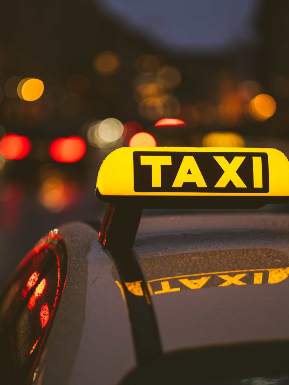 Taxi Latino Carxi taxi-sign-on-car-during-night